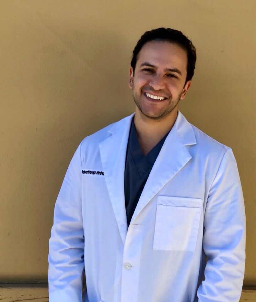 Smile Care Valencia - Robert P. Hedvat, DDS logo